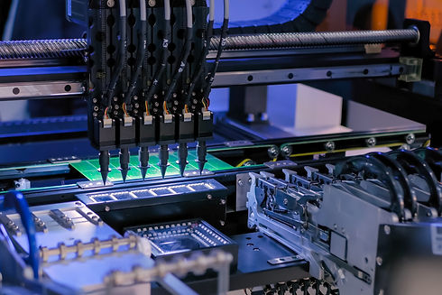 Assembly of computer circuit board - automatic SMD pick and place machine during work at f