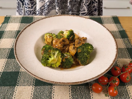 Broccoli and mushrooms in a frying pan