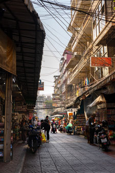A busy street in Bangkok during the day
