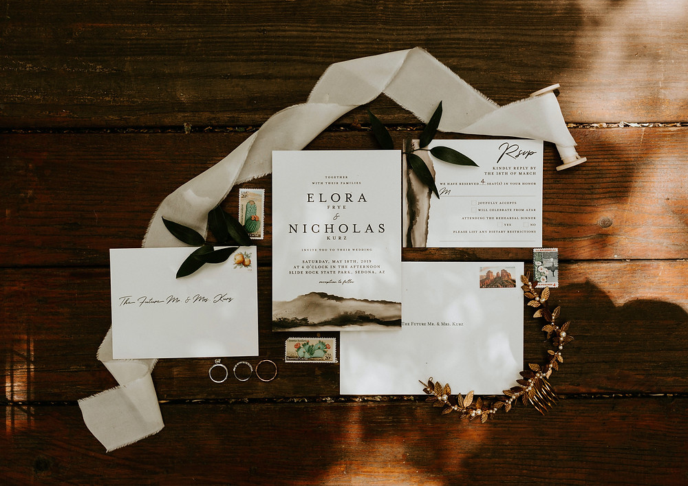 Sedona May wedding flat lay stationery and Agnes Walker headpiece