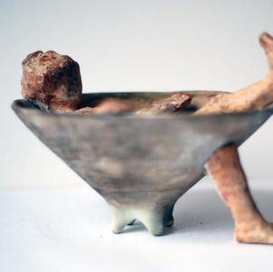 Contemporary sculpture. 'I ate too much'. Clay sculpture by Albena Shkodrova.