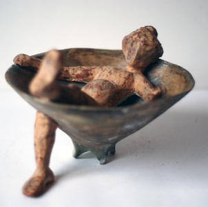 Contemporary sculpture. 'I ate too much'. Clay sculpture by Albena Shkodrova.