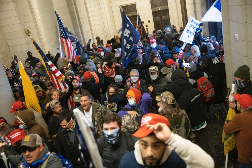 Protesters supporting President Trump gather near the east front door of the U.S. Capitol after groups breached the building’s security on January 06, 2021 in Washington, DC. Win McNamee/Getty Images.