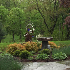 NY Bird bath in fron of Whit's sculpture.jpeg