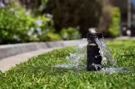 Sprinkler Lines Gushing Water When Turned Off? 2026 Guide