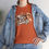 Thumbnail: "Dibs on the Cowboy" Western Tee