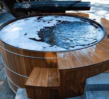 Custom cedar hot tub with steps
