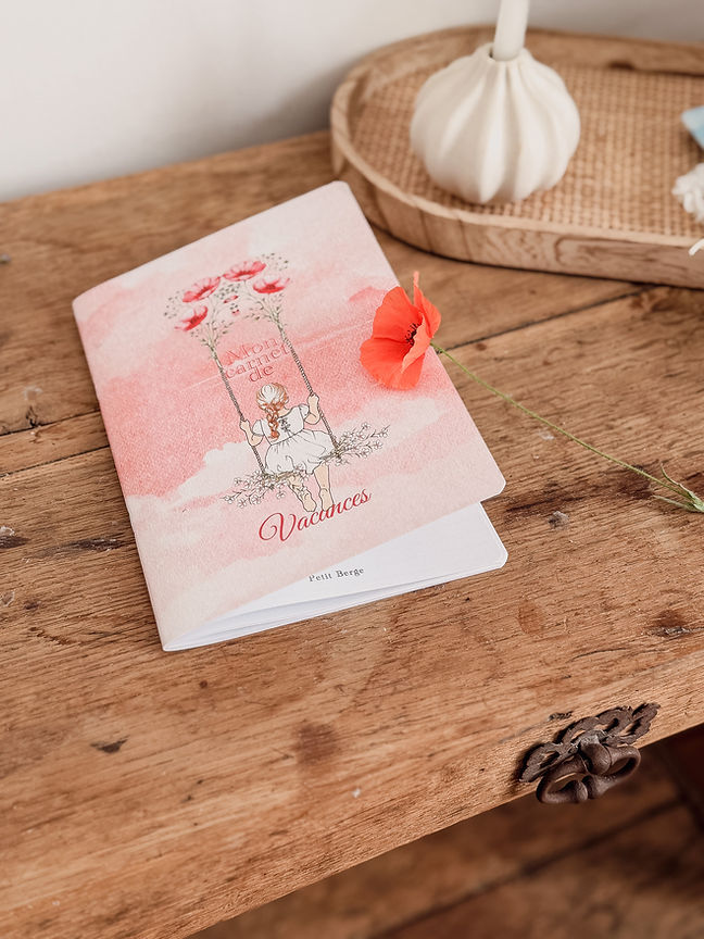 carnet souvenirs de vacances Petit Berge fille sur la balançoire