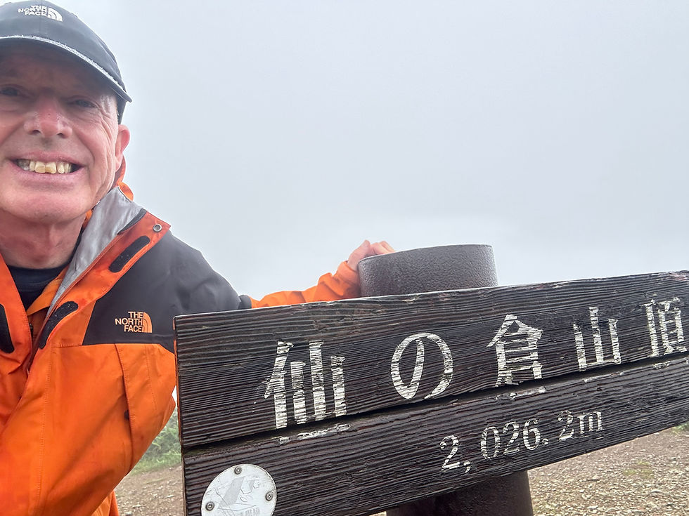 Relief at finally making it through the winds to Sennokura summit