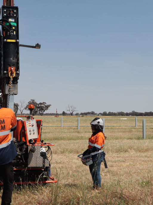 Workers around a piling rig