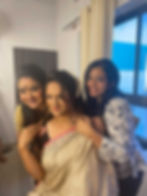 Women styling a saree to rent luxury fashion online