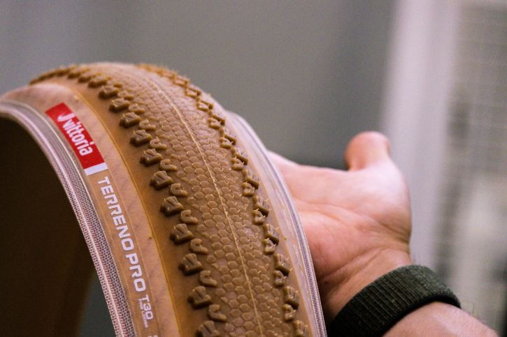 Hand holding aVittoria Terreno Pro T30 Gravel Bike Tyre