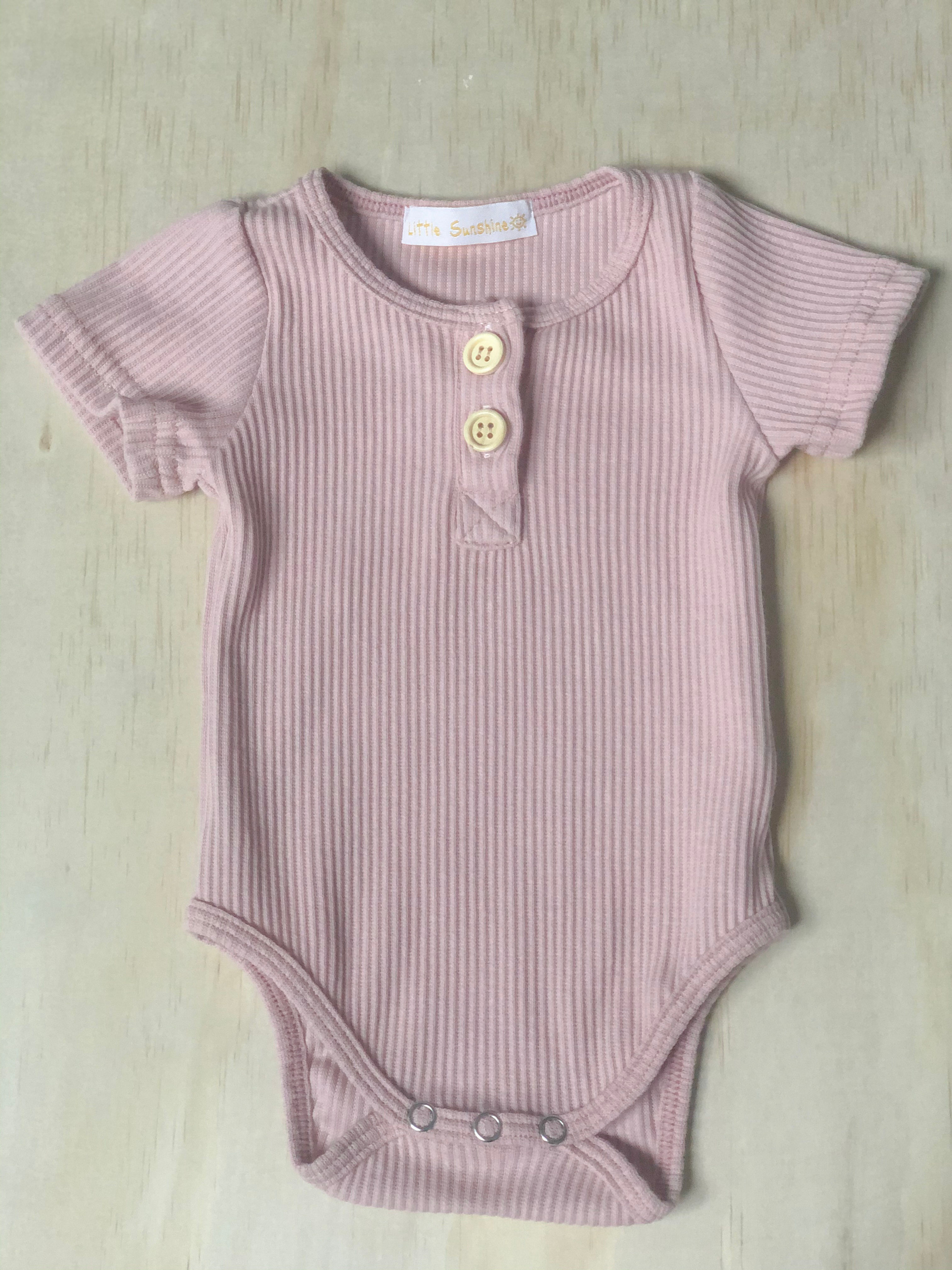 Dust pink ribbed onsie