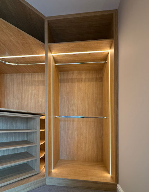 Hanging rails in wardrobe interior