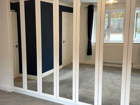 mirrored hinged fitted wardrobes in Exeter