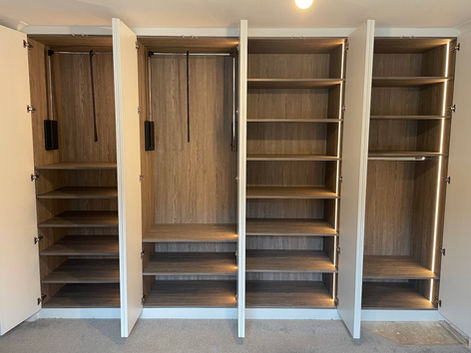 wardrobe interior with pull out rails