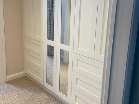 traditional cream fitted wardrobes with mirror doors in Exeter