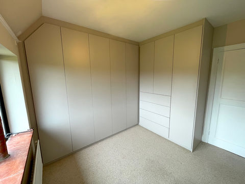 fitted wardrobes L-shaped wardrobe on two walls in Exeter