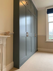 Blue Shaker Wardrobes in alcove
