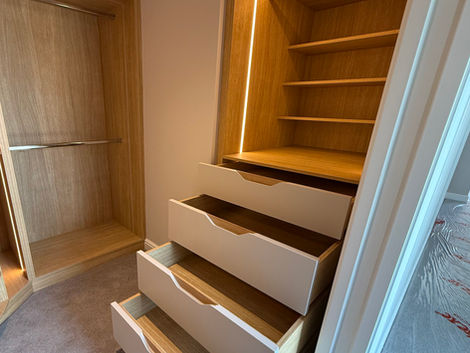 Pull-out drawers in walk-in wardrobe