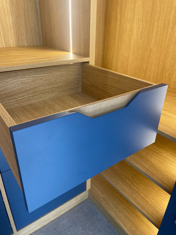 blue wardrobe drawers with oak inset handles
