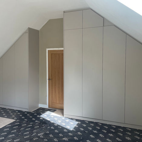 two wardrobes in loft bedroom