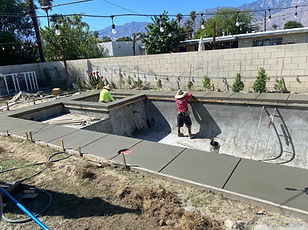 LUXOASIS custom pool construction aerial view in progress in the Coachella Valley
