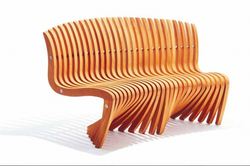 Wooden bench with unique design. Diamond Tropical Hardwoods for elegant seating.