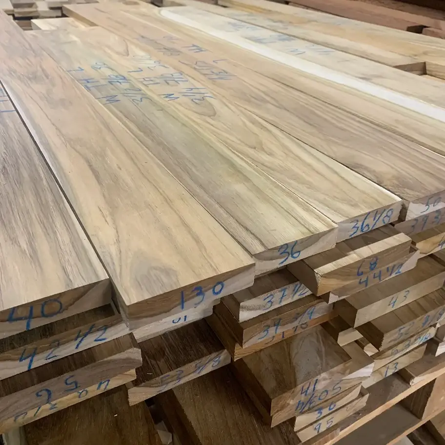 Planked lumber with markings represents the Highly Figured Mahogany Lumber, a tropical hardwood.