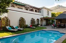 a_tuscan_villa_outside_pool_view-131e7503.webp
