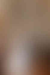 bride and groom praying during catholic ceremony at St. Francis Xavier Catholic Church, Petoskey.