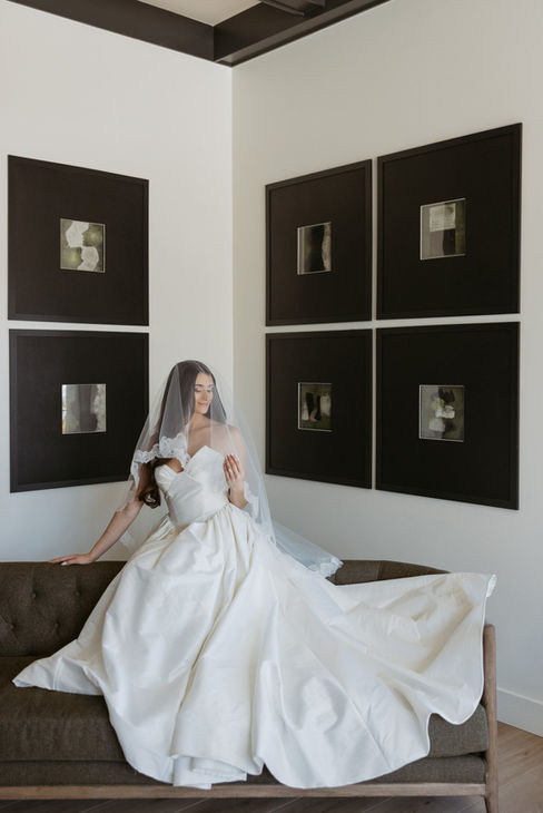 Editorial Portrait of a bride with her mantilla veil draped over her. Editorial photos by Grand Rapids Wedding Photographer. Grand Rapids Wedding Photography. Best West Michigan Photographers. Best Holland Wedding Photographers. Best Williamston Photographers.