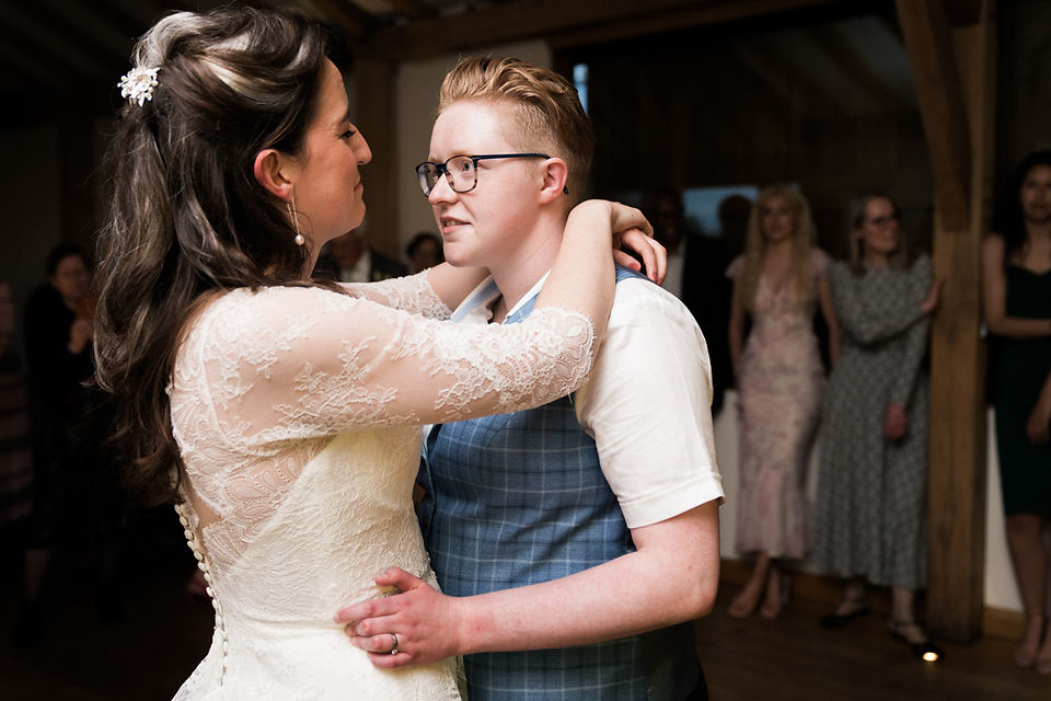 Natural wedding photography during first dance with same sex couple. Leicester wedding photographer. Covering wedding photography in Warwickshire, Derbyshire, Northamptonshire, Lincolnshire, Nottinghamshire. Darley and Underwood Photography.