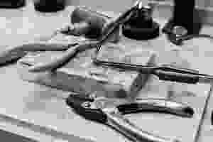 Lucy Flint Jewellery. Pendant on workbench. Image by Darley and Underwood Photography. Film wedding photography.