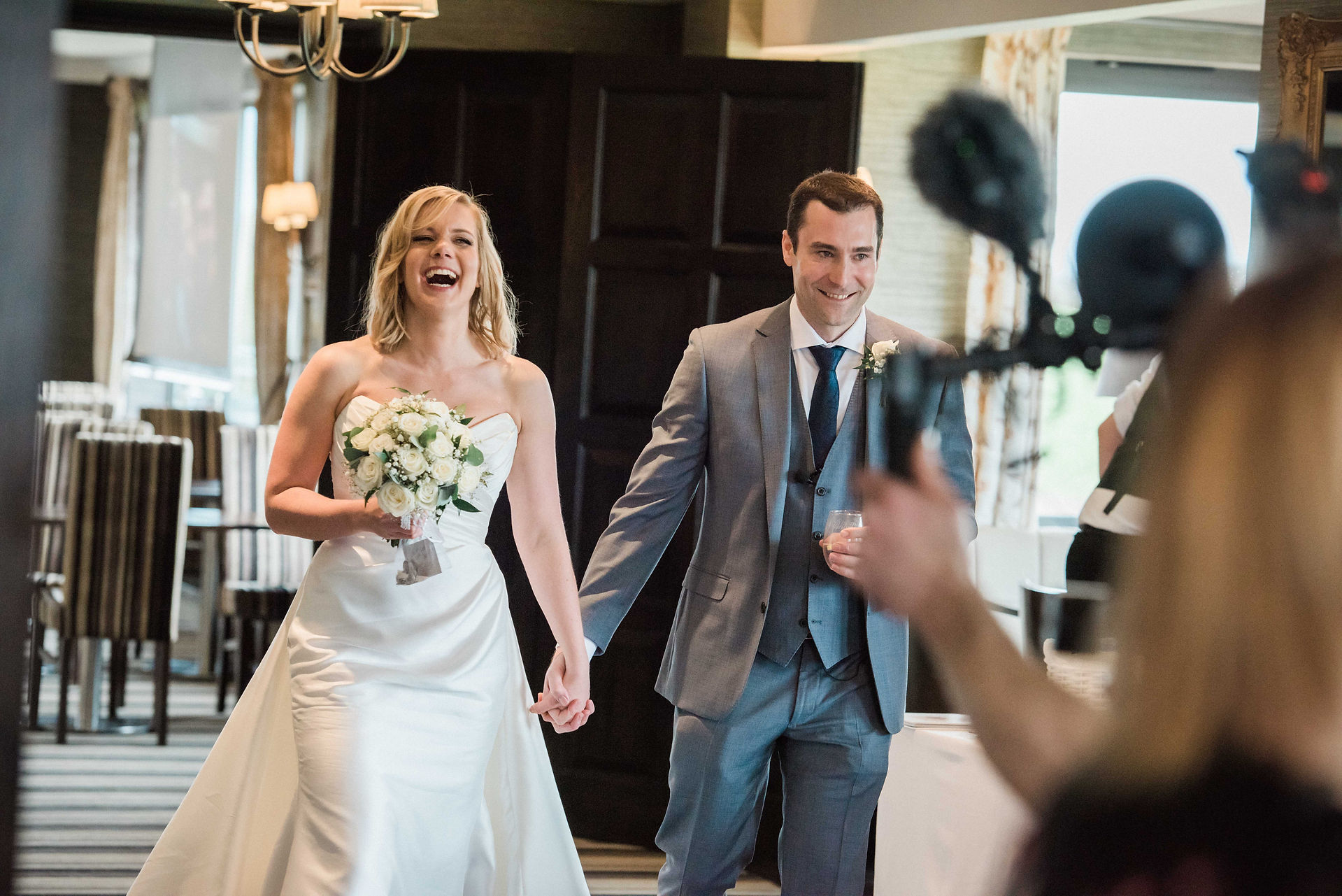 The Nottinghamshire wedding venue. Bride and groom entrance to the wedding breakfast.