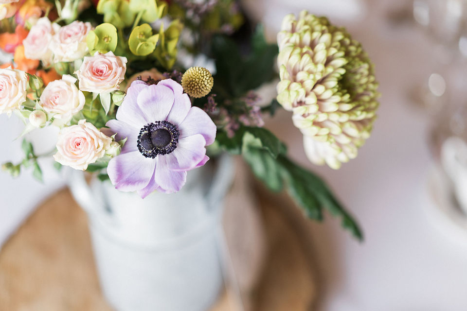 Floral centre piece at Dodford Manor. Gay wedding photography at Dodford Manor wedding venue for key workers. Natural wedding photography. Leicester wedding photographer. Covering wedding photography in Warwickshire, Staffordshire, Derbyshire.