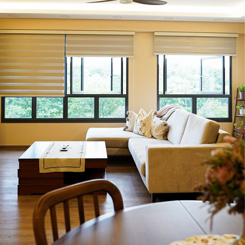 Modern living room with couch and table.