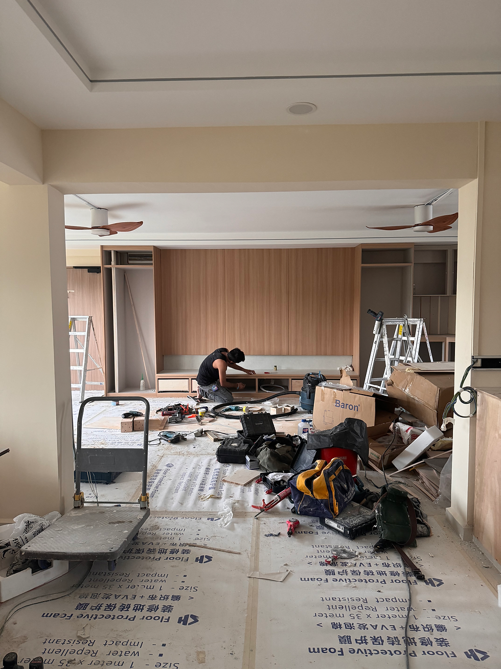 Eye-level view of a modern living room renovation in progress
