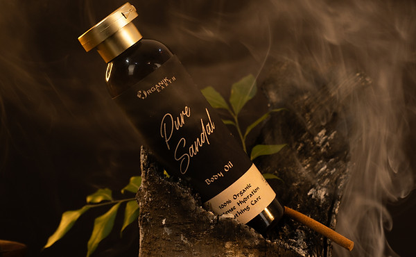 Close-up of premium glass body oil bottle with soft shadows – elegant product detail