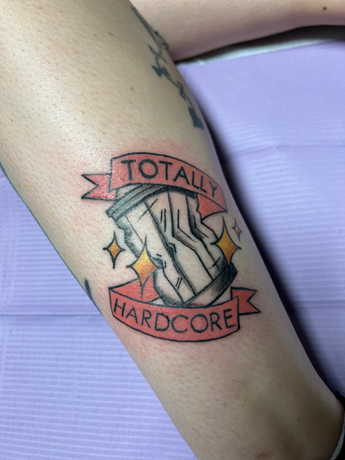 Wrestling Tattoo by Stephanie Prescott-Flynn at Atomic Tattoo and Piercing.