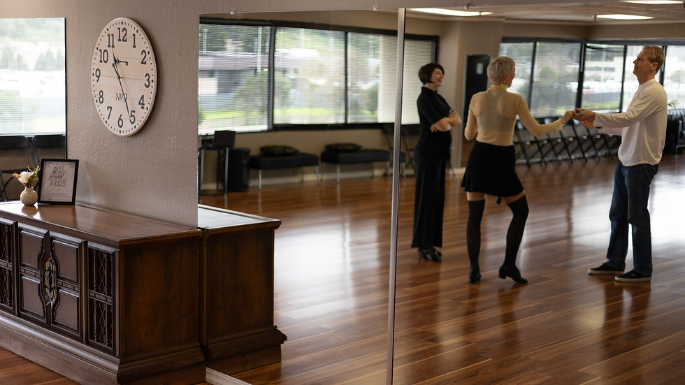 Owner and Studio Director, Natalie Kelly, teaches a lesson to students.