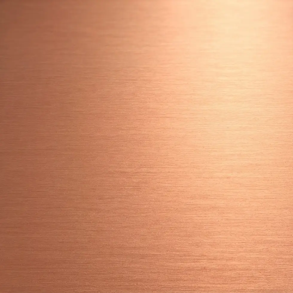 Brushed metal texture photography of copper. The surface reflects warm light, giving an elegant and industrial feel.
