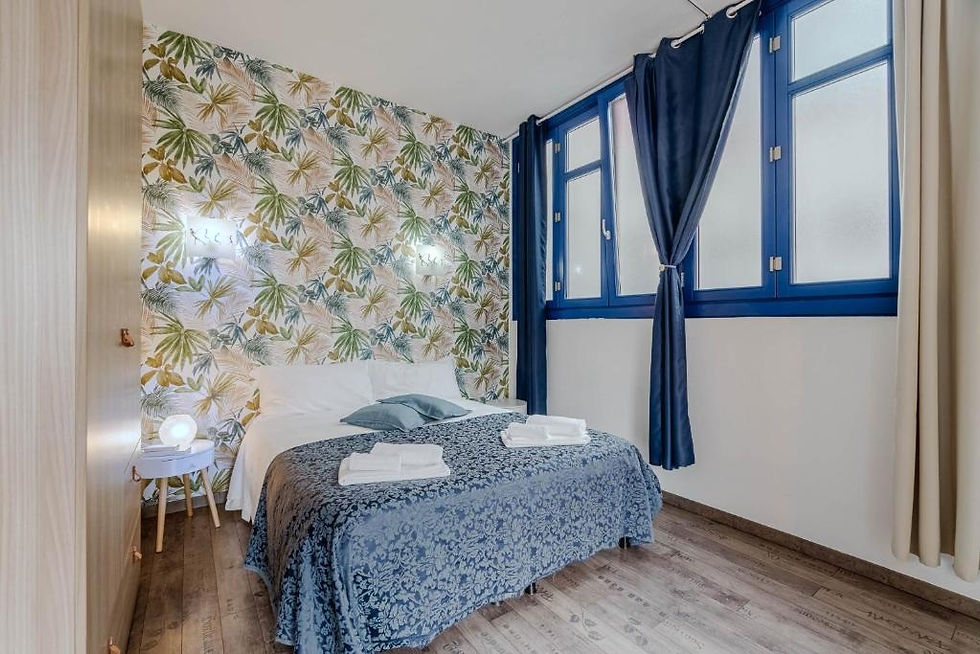 Camera da letto della Casa di Nene, appartamento turistico in San Salvario a Torino