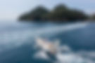 Boat cruising the turquoise waters of the Portofino Marine Protected Area, Italian Riviera