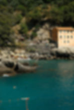 Hidden cove with crystal-clear water along the Portofino promontory