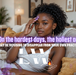 a photorealistic image of a beautiful African American woman holding an amethyst healing crystal to her forehead while lying comfortably on a couch in her modern yet Afrocentric living room; Lightworkers Garden