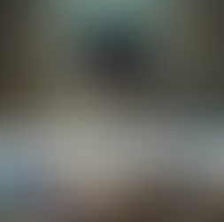 An abstract, mystical, symbolic portrayal of a African American woman in a cozy, sensory-safe room wrapped in a weighted blanket and surrounded by calming tools; Lightworkers Garden