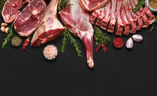 Assortment of various raw lamb cut parts with copy space.jpg