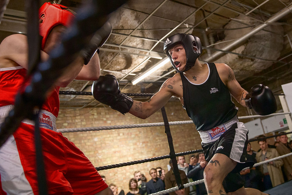 Eye-level view of a boxing trainer demonstrating techniques