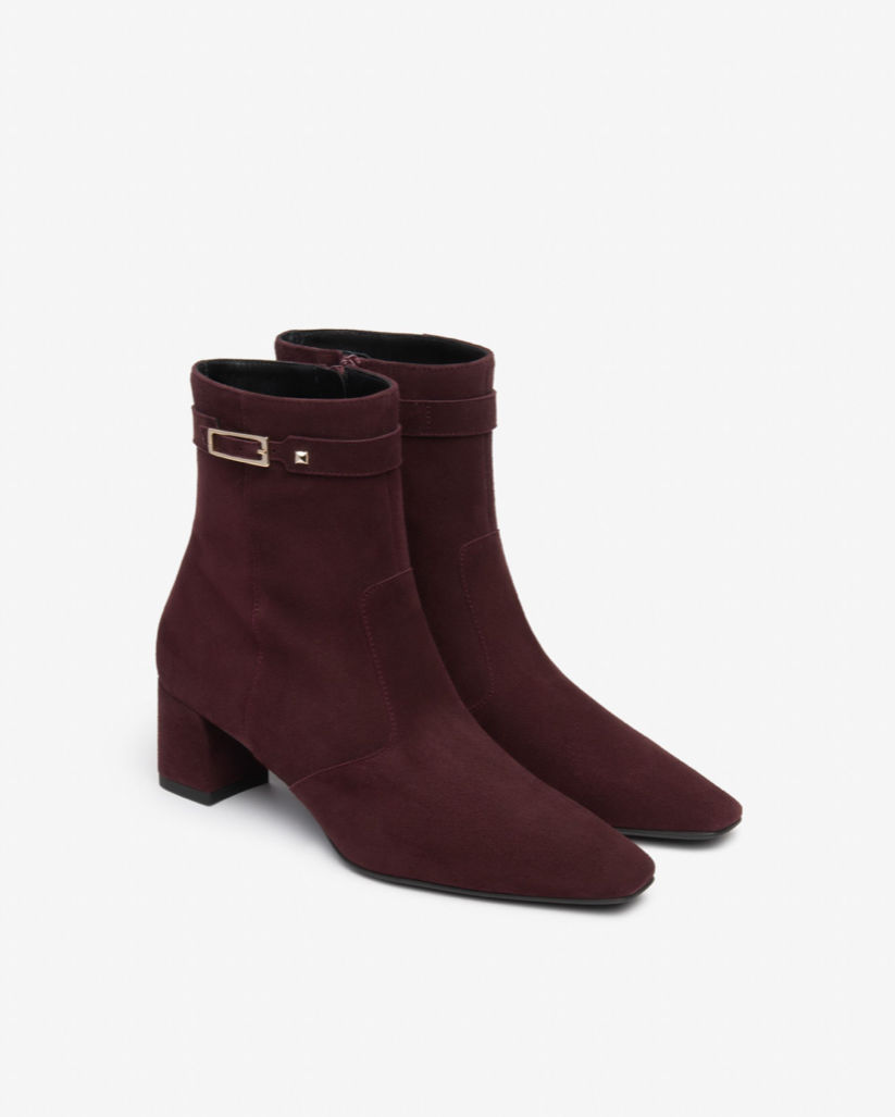 NeroGiardini women's burgundy suede ankle boot with block heel and buckle detail.